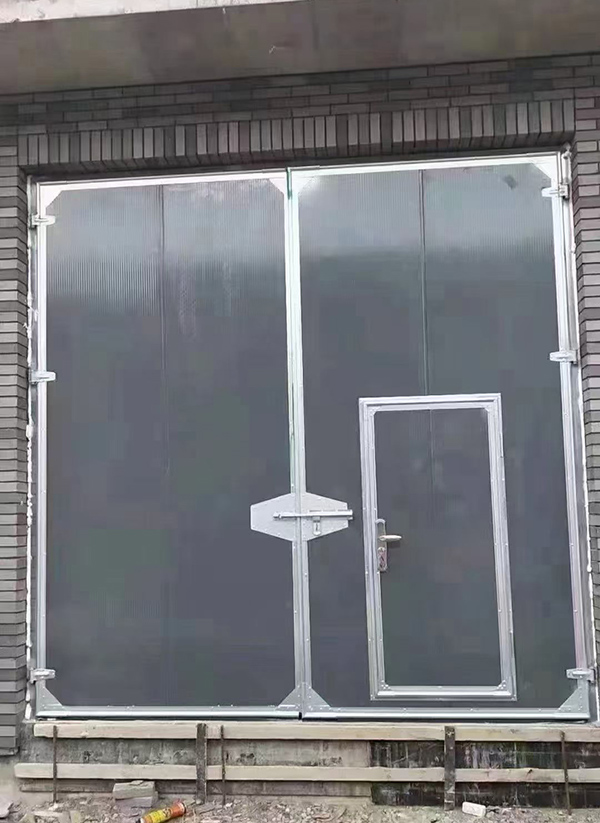 叶城工业平开门在大型设备制造车间的应用实例